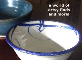 Closeup of white pottery bowl with blue rim and interior swirl design in front of dark bluegreen bowl Text: a world of artsy finds and more!