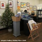 Artspace Gallery Holiday Show 2016 with Christmas tree, art displayed on walls and shelves