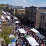 Crowds & white tents on main street at Bloomsburg Renaissance Jamboree