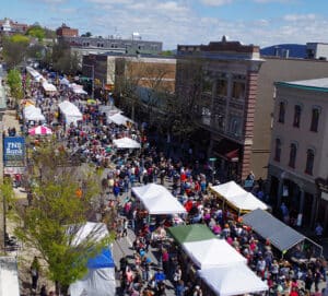 Crowds & white tents on main street at Bloomsburg Renaissance Jamboree