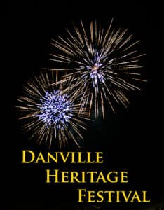 Two sunburst fireworks with blue white centers and gold streamers against night sky Danville Heritage Festival