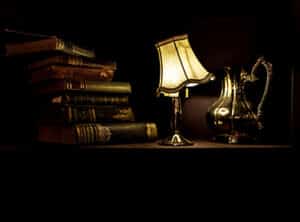 Antique books, lamp, pitcher by Jez Timms @https://unsplash.com/@jeztimms 