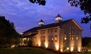 night time outside view of Brew Pub Restaurant with focal lights gleaming from the bottom