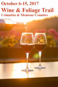 October 6-15, 2017 Wine & Foliage Trail Columbia & Montour Counties text against background of fall colors and bottle pouring red wine into two glasses