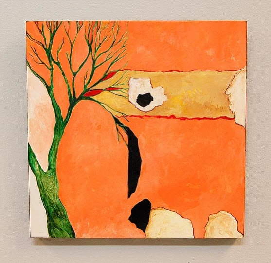 painting of tree with bare branches, leaf, and flower against coral background