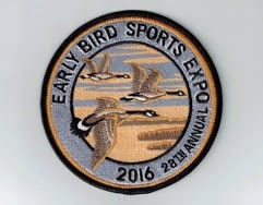 round emblem with three brown, black & white geese in flight Black text around edge: Early Bird Sports Expo 2016