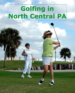 two women enjoying a sunny day of golf in North Central Pa