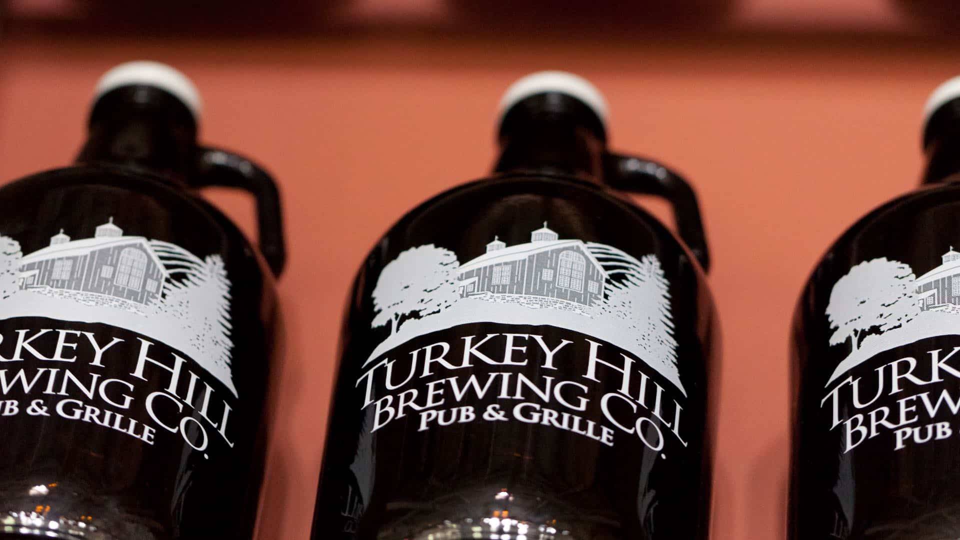 Close up view of Turkey Hill Brewing Co. jugs of beer