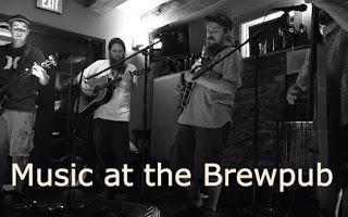 black & white three guitar players on stage with microphones in front Text: Music at the Brewpub