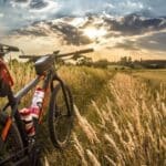 Bike on grass looking at hills in distance