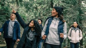 family hiking together in the woods