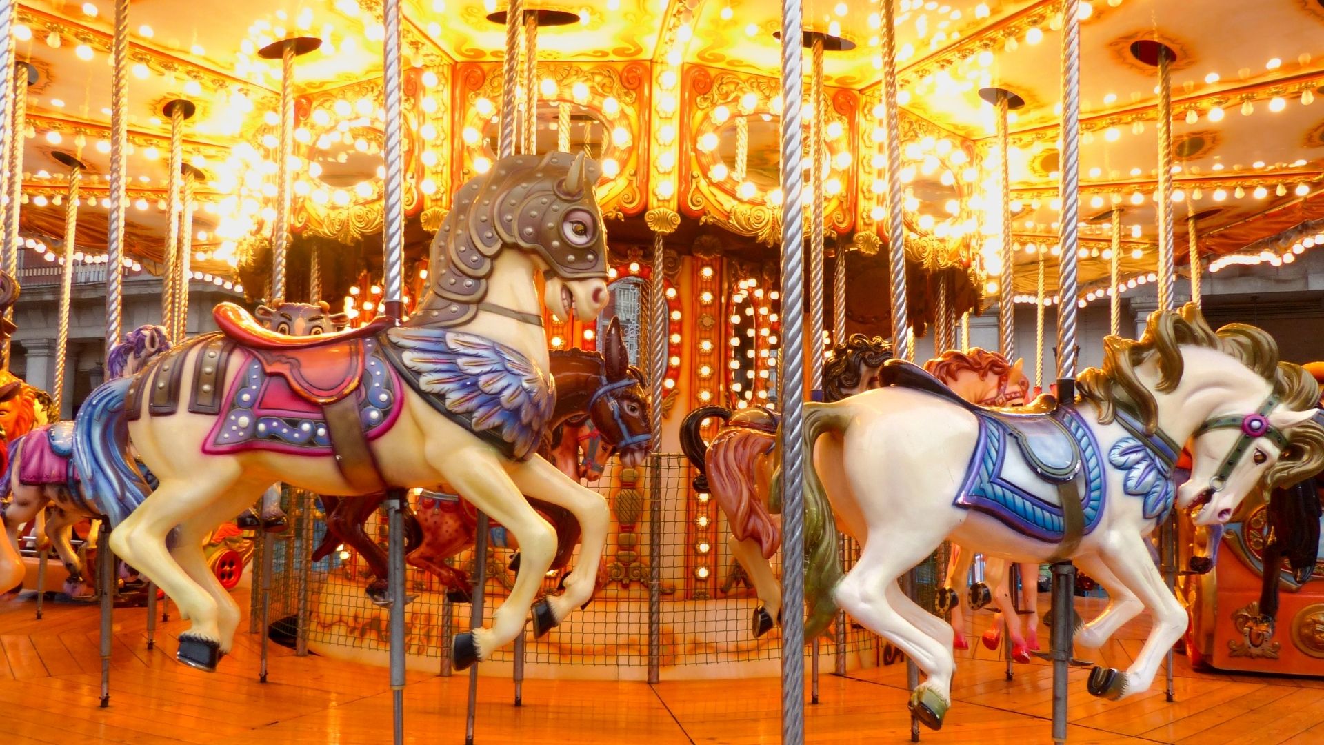 closeup of horses on a carousel
