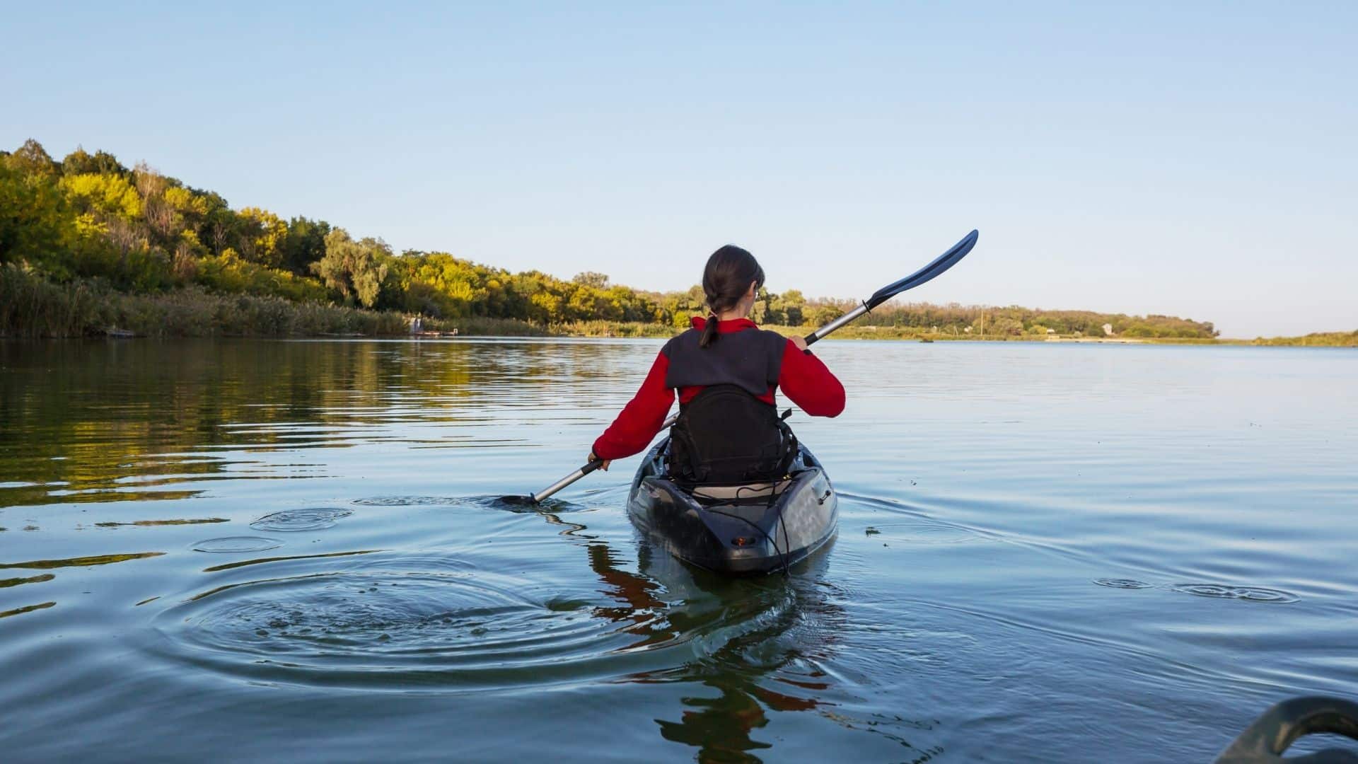person river kayaking on a summer day