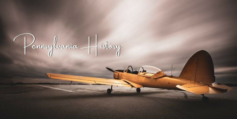 Artistic photo of a vintage yellow plane with text “Pennsylvania History”