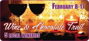 2 glasses red wine against white & gold snowflakes background text: wine and chocolate trail February 8 - 17, 2019